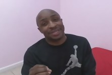 Tattooed Chocolate Blowing a Big Black Cock in a Joyful Way